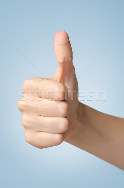 Plaster on female thumb Stock photo © CsDeli