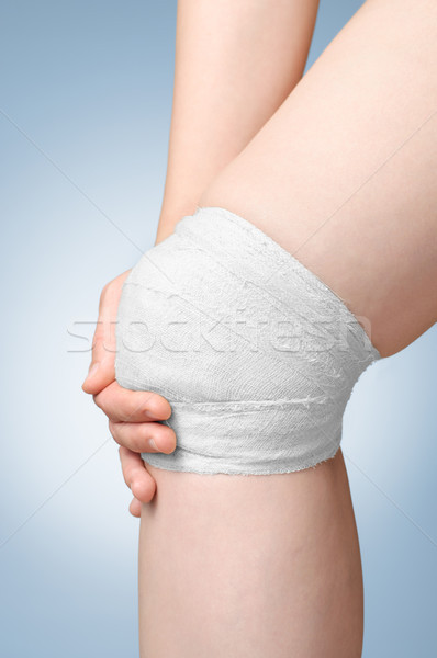 Verletzt Knie Verband schmerzhaft weiß Hand Stock foto © CsDeli