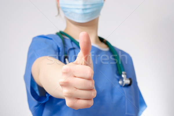 Doctor with thumbs up gesture Stock photo © CsDeli