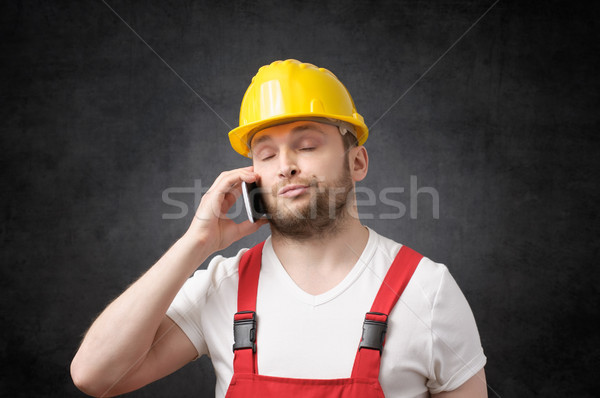 Foto stock: Trabajador · de · la · construcción · retrato · hablar · teléfono · construcción