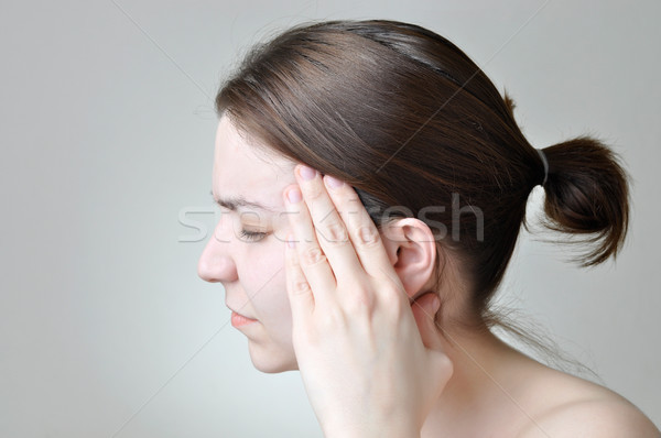 Dor de cabeça mulher jovem saúde estresse cabeça dor Foto stock © CsDeli