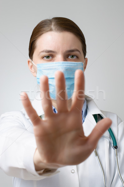 Doctor showing stop sign Stock photo © CsDeli