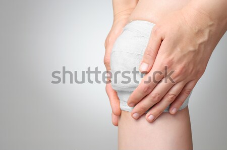Herido rodilla sangriento vendaje doloroso blanco Foto stock © CsDeli