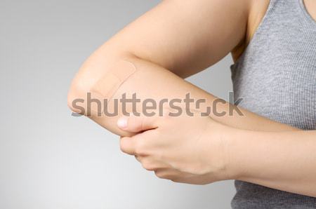 Gips weiblichen Arm Klebstoff Verband blau Stock foto © CsDeli