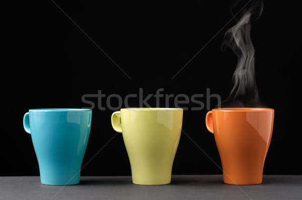 Three colorful mug with steam Stock photo © CsDeli