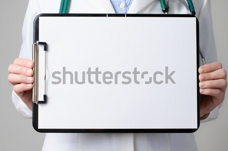 Foto stock: Médico · portapapeles · femenino · papel · en · blanco · mujer