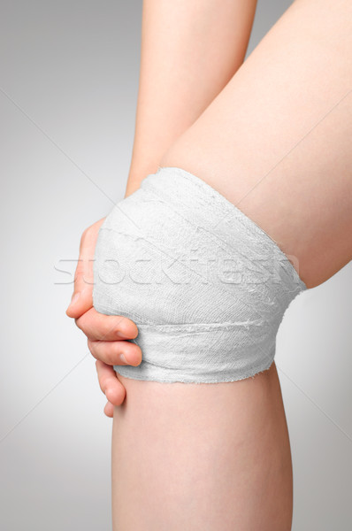 Injured knee with bandage Stock photo © CsDeli