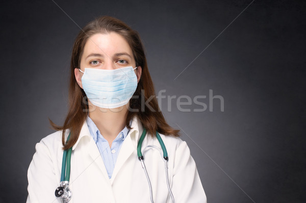 Doctor wearing protective mask Stock photo © CsDeli