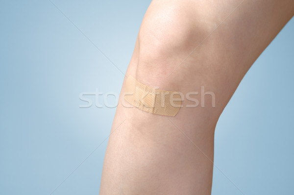Plaster on female leg Stock photo © CsDeli