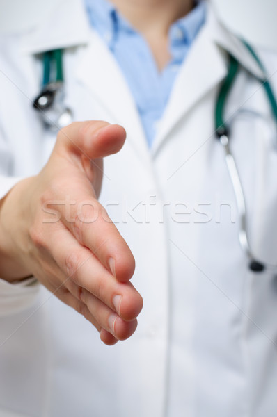Weiblichen Arzt bietet Handshake Hand Stock foto © CsDeli