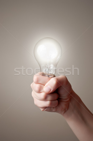 Mano bombilla tecnología vidrio Foto stock © CsDeli