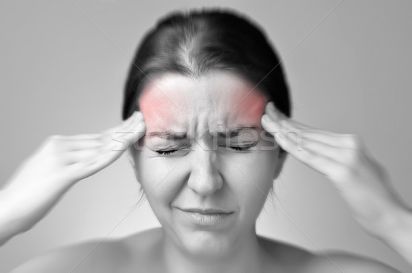 Fiatal nő migrén tart fájdalmas fej lány Stock fotó © CsDeli
