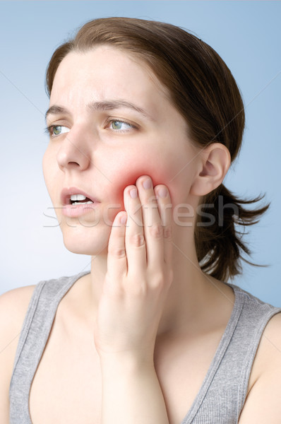 Femeie durere de dinti fată mână Imagine de stoc © CsDeli