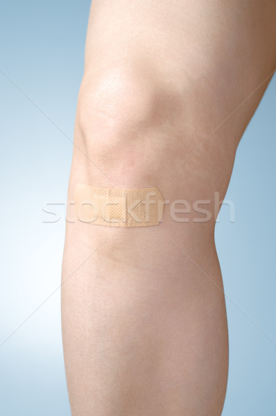 Intonaco femminile gamba adesivo fasciatura blu Foto d'archivio © CsDeli