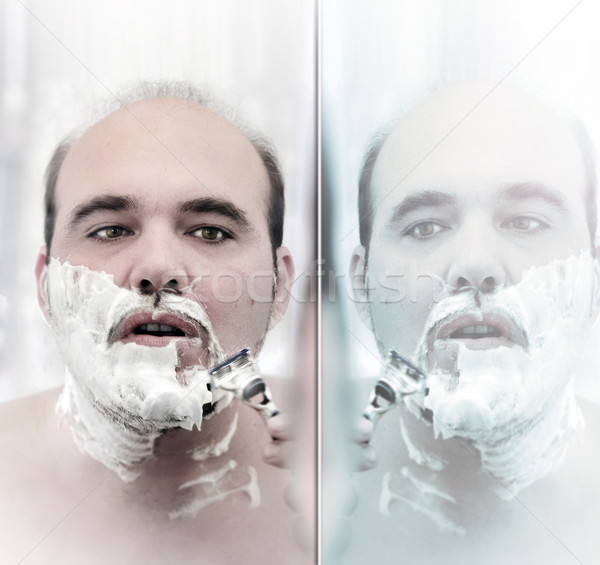 Man shaving face Stock photo © curaphotography