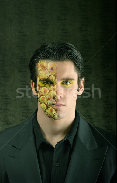 young man with half face painted Stock photo © curaphotography