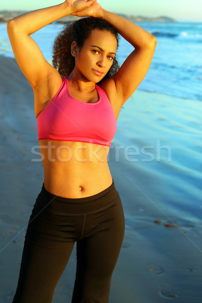 Portrait of a pretty woman by the ocean Stock photo © curaphotography