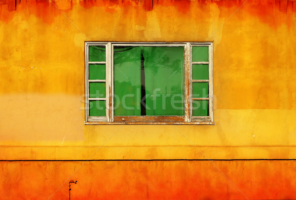 Green window on yellow wall Stock photo © curaphotography