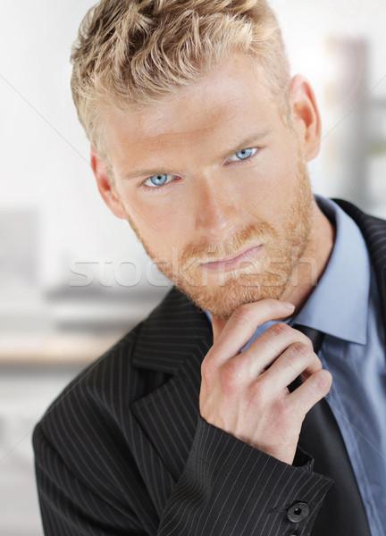 Young smart businessman Stock photo © curaphotography