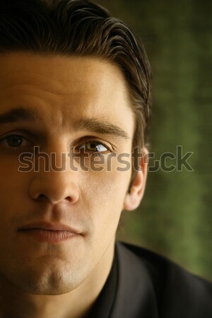 Sinister man half gezicht jonge man haren Stockfoto © curaphotography