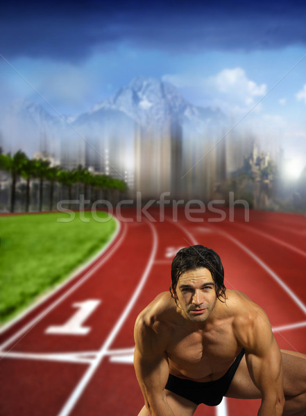 Male runner on track field Stock photo © curaphotography