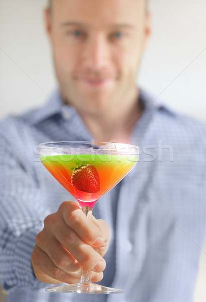 Kolorowy koktajl pić zamazany człowiek Zdjęcia stock © curaphotography