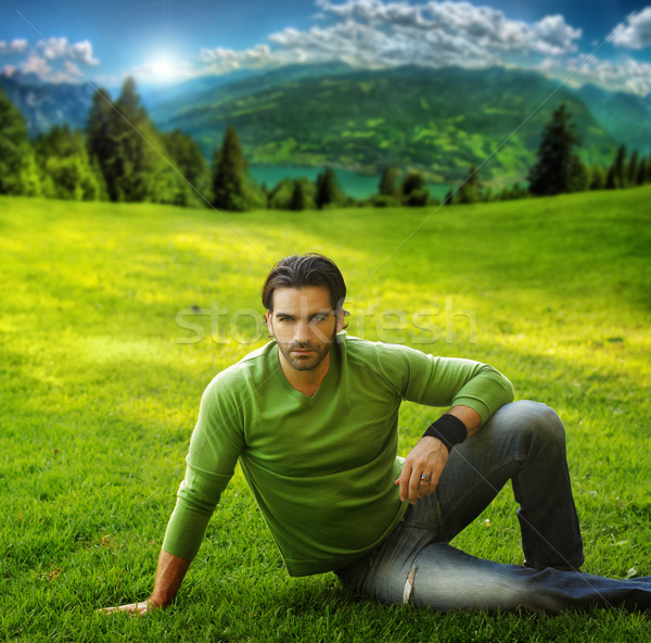 Man on grass Stock photo © curaphotography