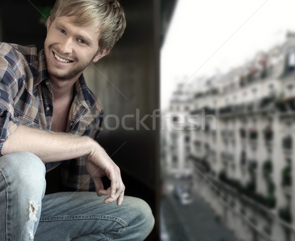 Młodych facet portret szczęśliwy młody człowiek Zdjęcia stock © curaphotography