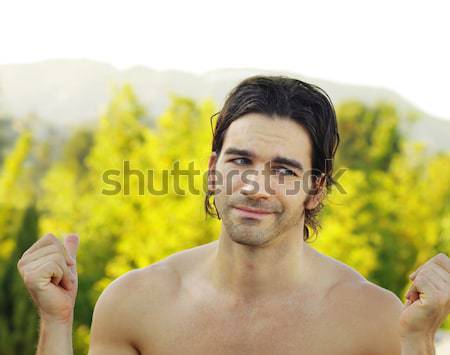 Outdoor smiling guy Stock photo © curaphotography
