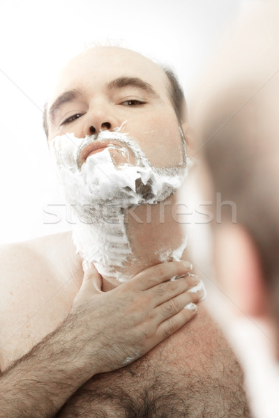 Man shaving face Stock photo © curaphotography
