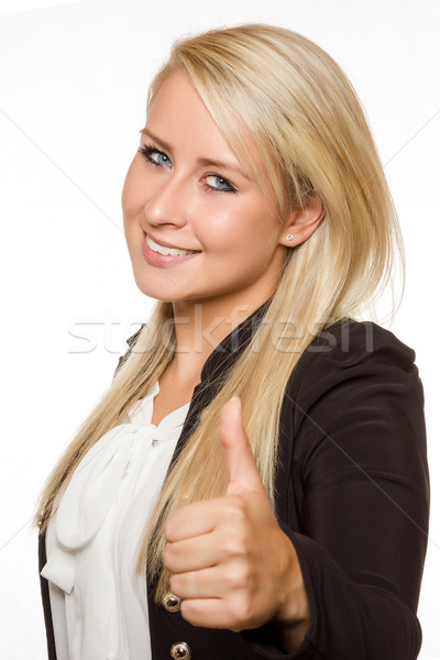 Young woman showing thumbs up with her hands Stock photo © Cursedsenses