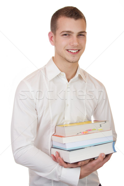 Fiatal üzletember hordoz könyvek üzletember mosoly Stock fotó © Cursedsenses