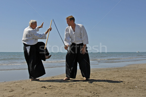 Eğitim aikido plaj iki yetişkin adam Stok fotoğraf © cynoclub