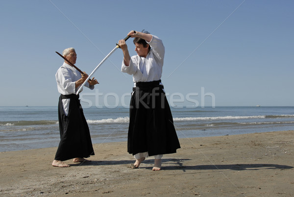 Treinamento aikido praia dois adultos homem Foto stock © cynoclub