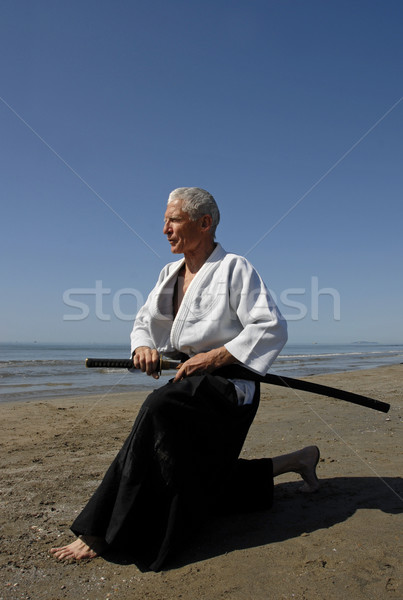 Treinamento aikido um velho praia mar Foto stock © cynoclub