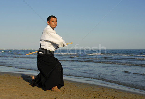 Aikido strand jonge man opleiding man zee Stockfoto © cynoclub