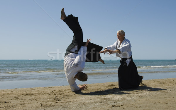 Aikido praia dois adultos treinamento homem Foto stock © cynoclub