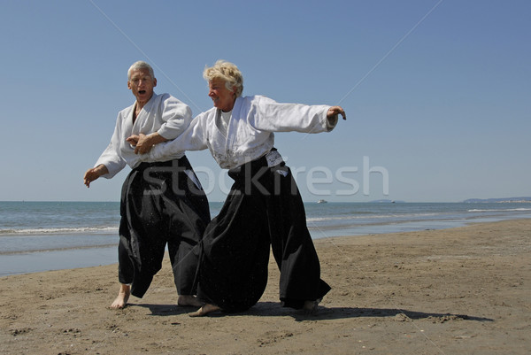 Stockfoto: Opleiding · aikido · strand · twee · volwassenen