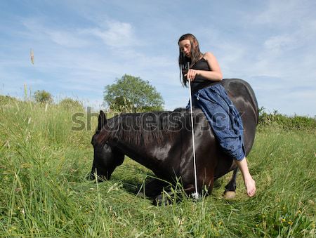 Cheval vers le bas équitation fille jeunes noir Photo stock © cynoclub