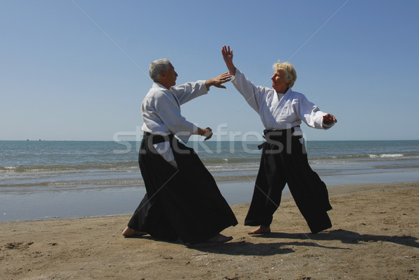 aikido sur la plage Stock photo © cynoclub