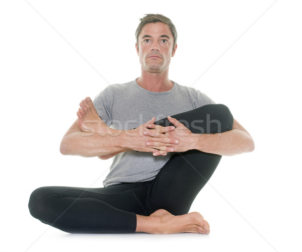 yoga man in studio Stock photo © cynoclub