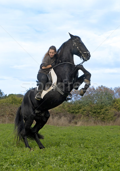 Photo stock: équitation · fille · noir · étalon · nature