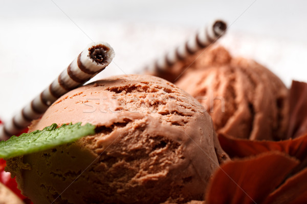 Chocolate ice cream with striped wafer biscuits Stock photo © d13