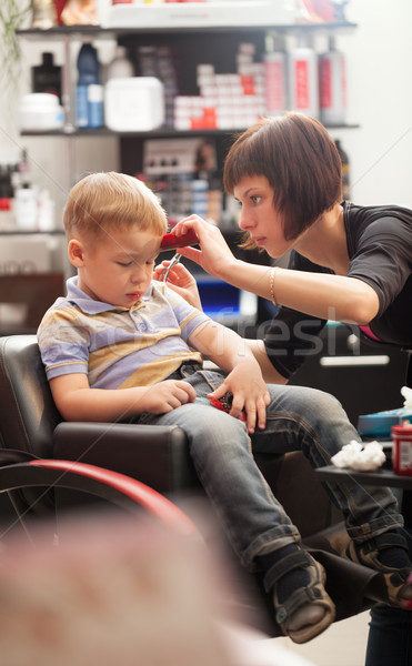 Little boy at the hairdresser Stock photo © d13