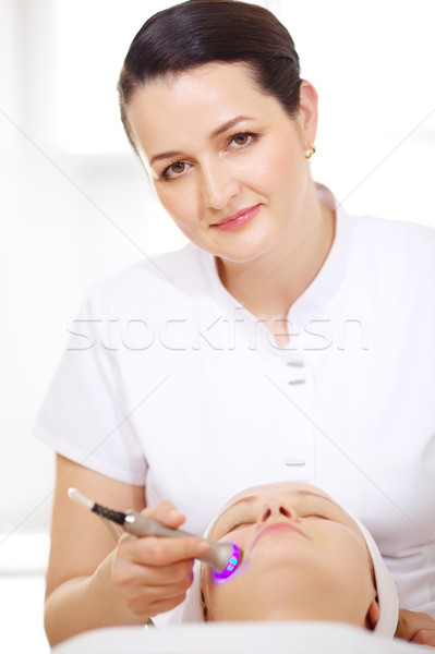 Cosmetician making lifting procedure Stock photo © d13