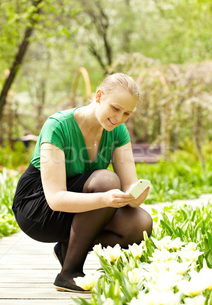 Foto stock: Menina · foto · flores · parque