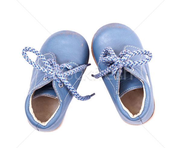 Stock photo: Old blue baby shoes