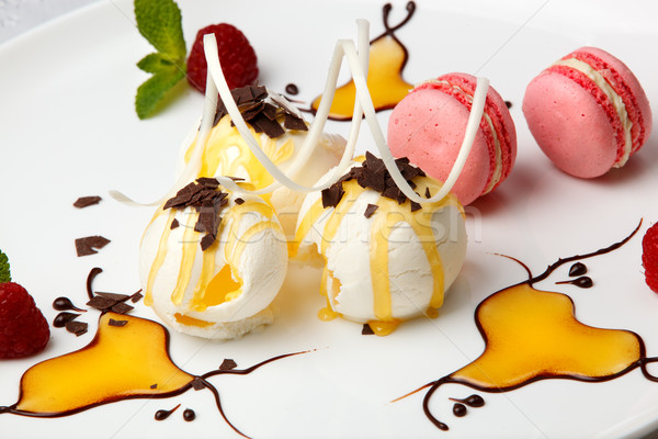 Pink macaroons with vanilla ice cream and honey Stock photo © d13