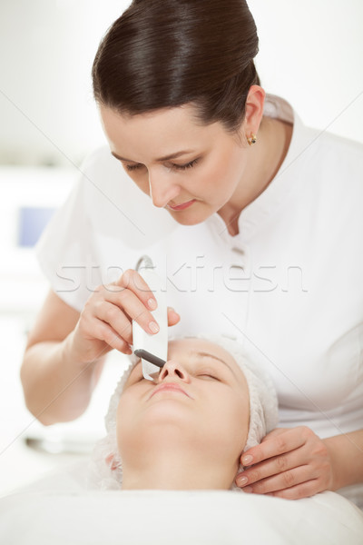 Ultrasonic facial cleaning at beauty treatment salon Stock photo © d13