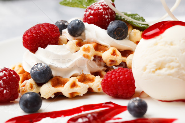Waffle with cream, ice cream and fresh berries Stock photo © d13